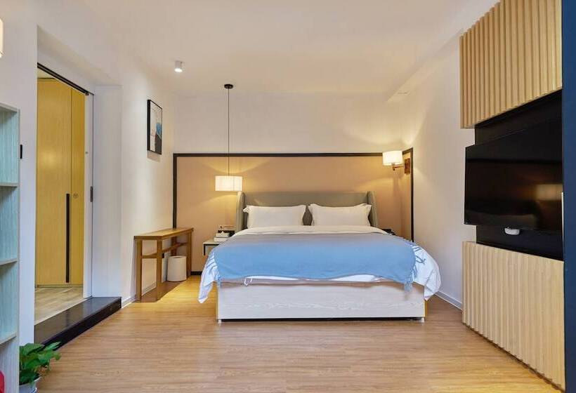 هتل Wuhua Xingxiang Shanfang