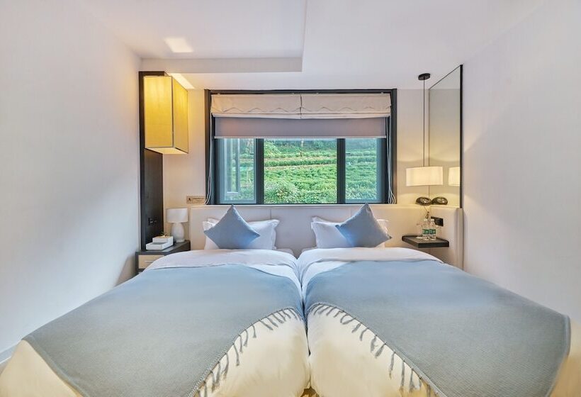 هتل Wuhua Xingxiang Shanfang