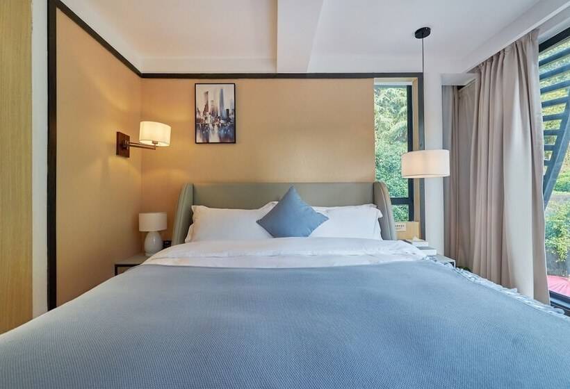 هتل Wuhua Xingxiang Shanfang