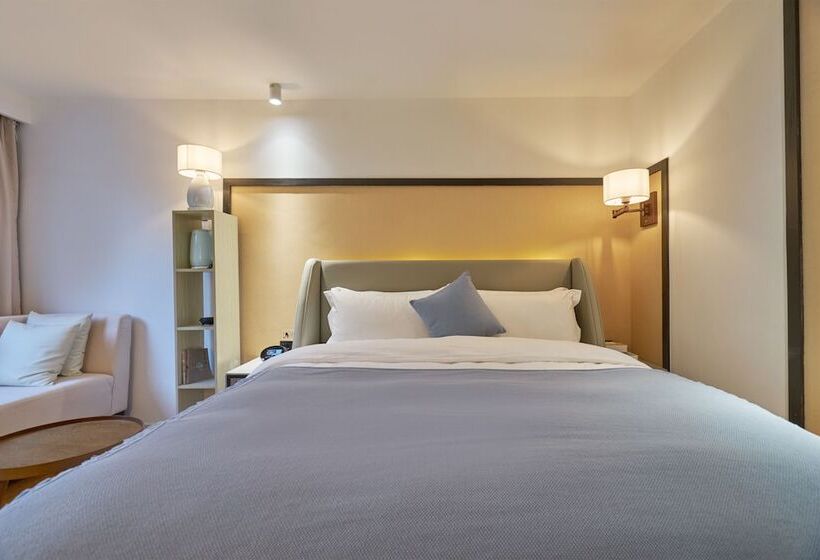 هتل Wuhua Xingxiang Shanfang