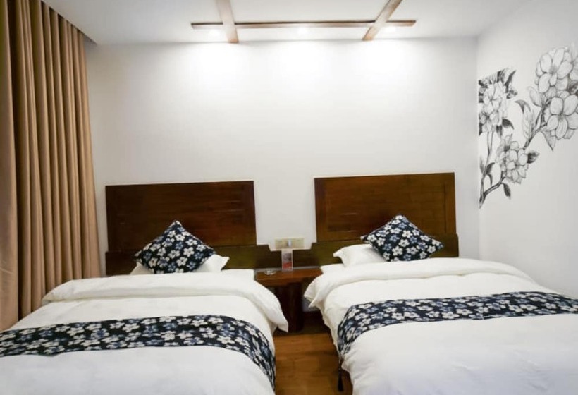 פונדק Floral Hotel · Spring Guesthouse Zhangjiajie