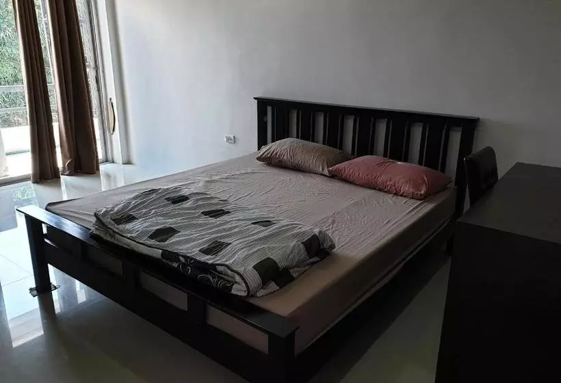 هتل Oyo 974 The Rest Village Apartment