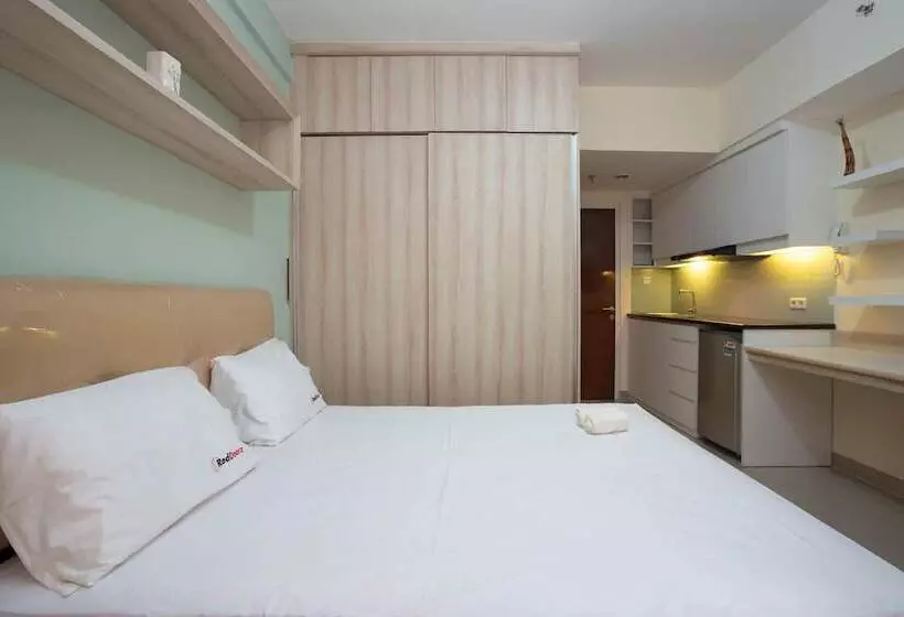 ペンション Reddoorz Apartment @ Taman Melati Margonda
