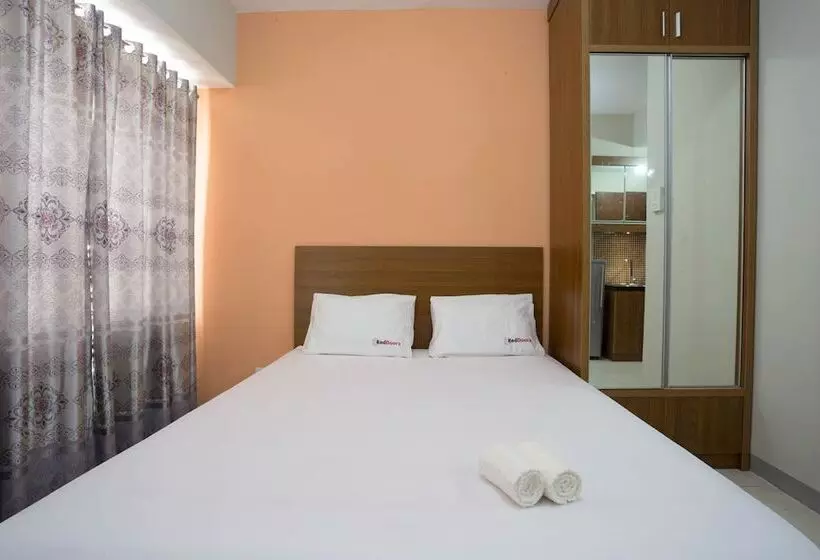 ペンション Reddoorz Apartment @ Taman Melati Margonda