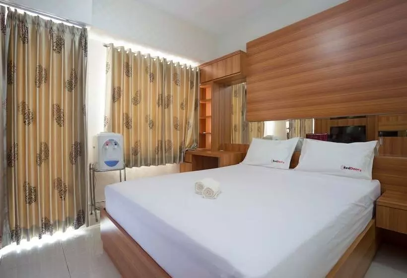 ペンション Reddoorz Apartment @ Taman Melati Margonda