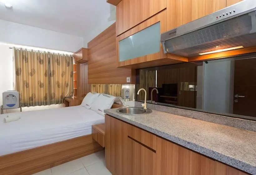 ペンション Reddoorz Apartment @ Taman Melati Margonda