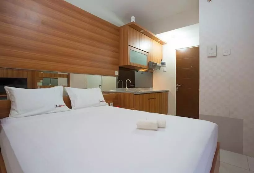 ペンション Reddoorz Apartment @ Taman Melati Margonda
