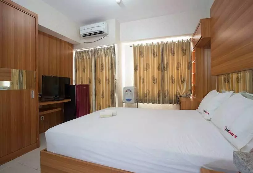 ペンション Reddoorz Apartment @ Taman Melati Margonda