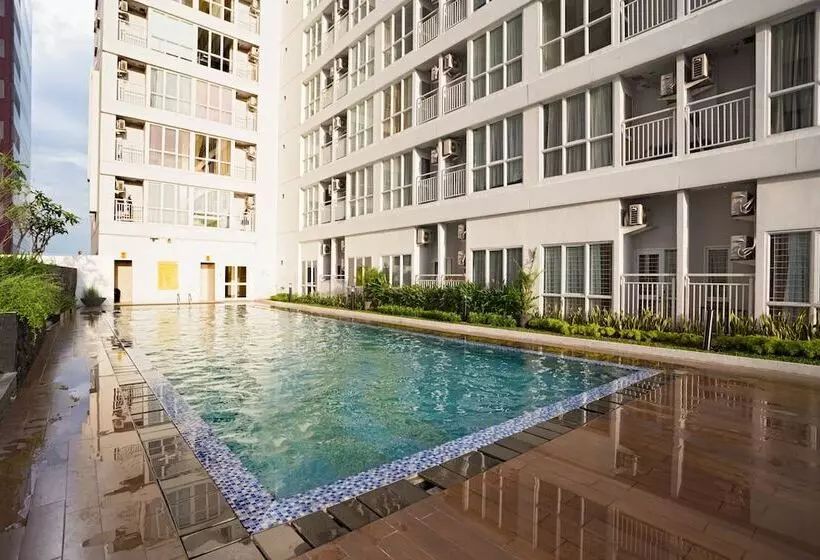 ペンション Reddoorz Apartment @ Taman Melati Margonda