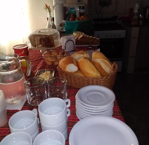 تختخواب و صبحانه Flor Do Pequi