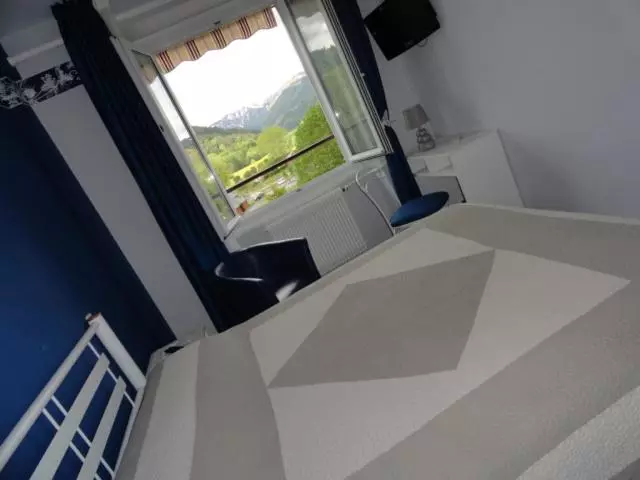 ホテル Logis Hôtel Le Beau Site