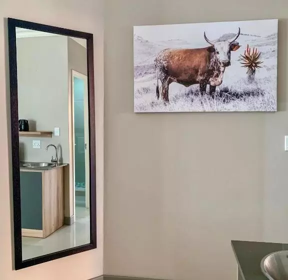 Отель At Hatfield Apartments