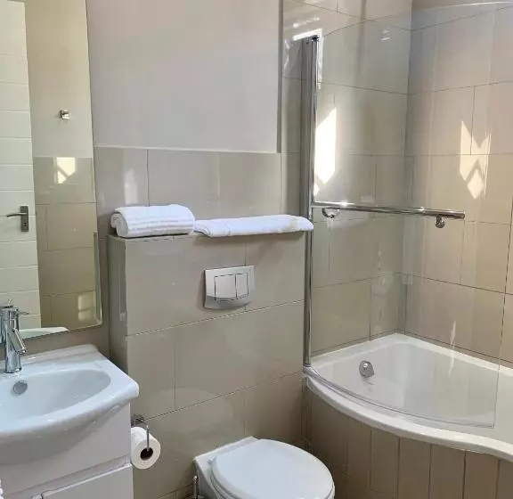 Отель At Hatfield Apartments