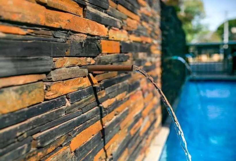 Отель At Hatfield Apartments