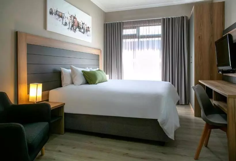 Отель At Hatfield Apartments