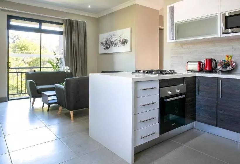 Отель At Hatfield Apartments