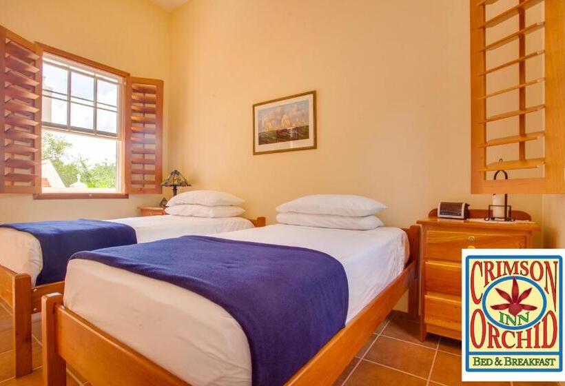 تختخواب و صبحانه The Crimson Orchid Inn At Orchid Bay