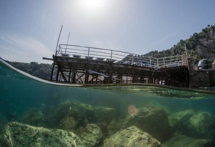 Отель Baia Di Puolo