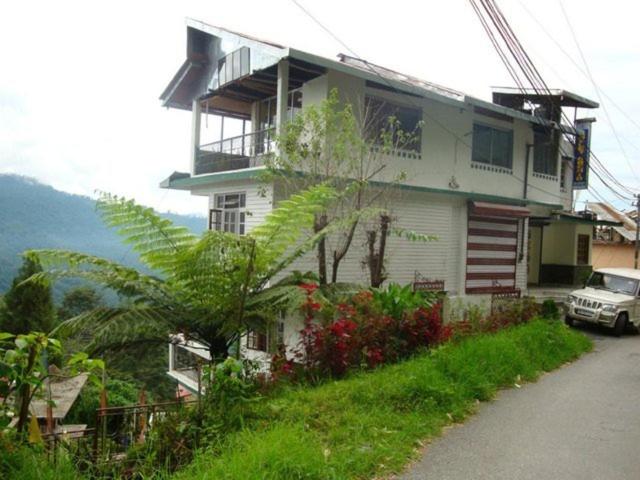 בית מלון כפרי Chalet Orchid Eco Retreat