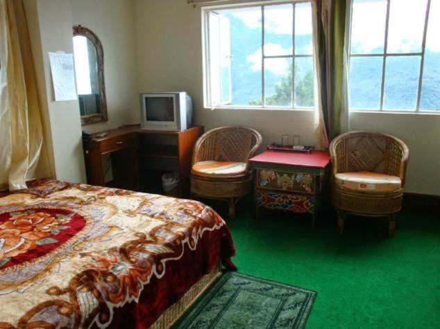 בית מלון כפרי Chalet Orchid Eco Retreat