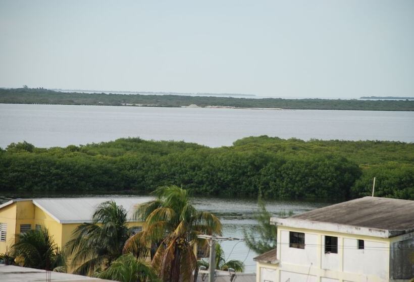 בית מלון כפרי Coastalbay 2 & Golf Cart Rental