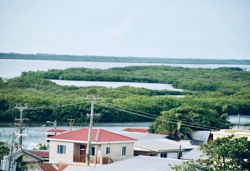 בית מלון כפרי Coastalbay 2 & Golf Cart Rental