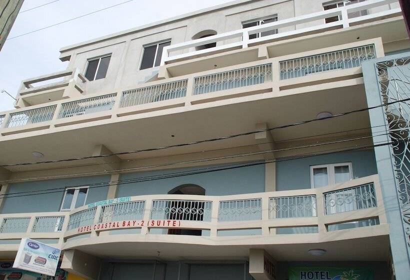 בית מלון כפרי Coastalbay 2 & Golf Cart Rental