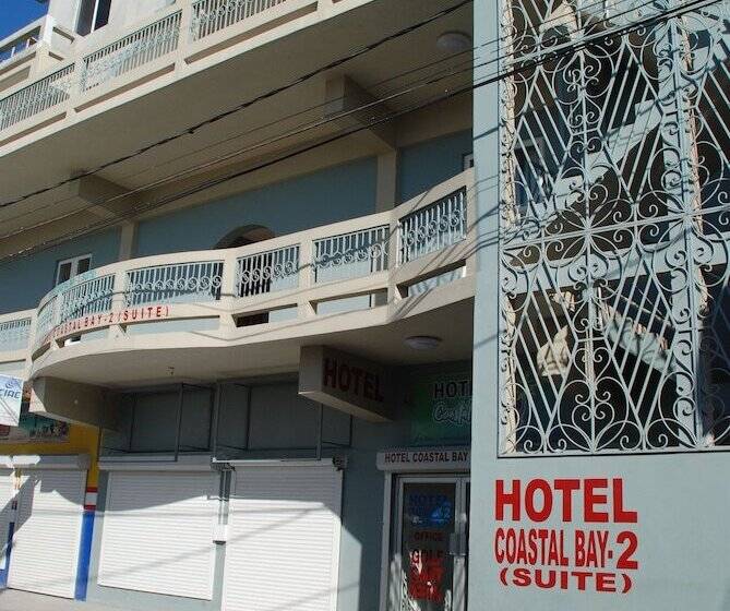 בית מלון כפרי Coastalbay 2 & Golf Cart Rental