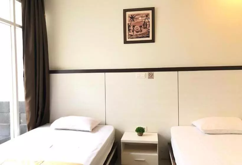 Hotelli Reddooz Plus At Ininnawa Homestay Syariah Palu