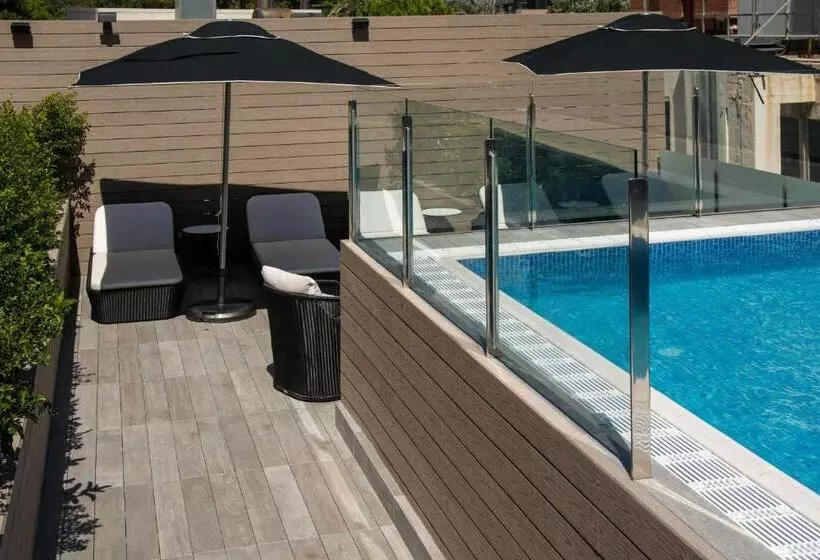 Отель Catalonia Rigoletto