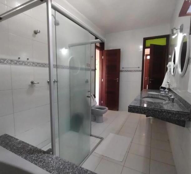 پانسیون Pousada Flor D' Açucena