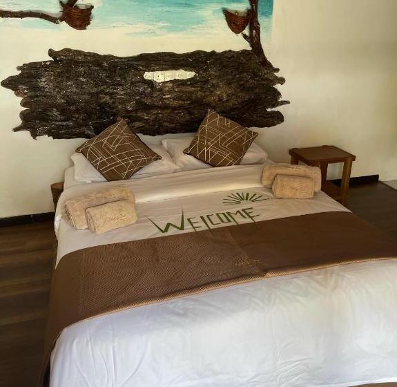 تختخواب و صبحانه Rising Sun Beach View