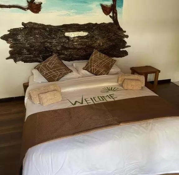 تختخواب و صبحانه Rising Sun Beach View