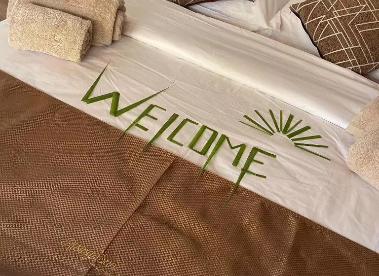 تختخواب و صبحانه Rising Sun Beach View