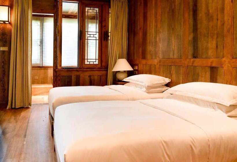 בית מלון כפרי Songtsam Tacheng Lodge