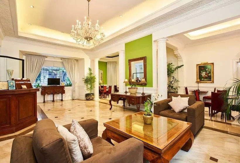 Отель Orchid Garden Suites