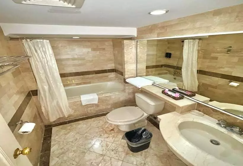 Отель Orchid Garden Suites