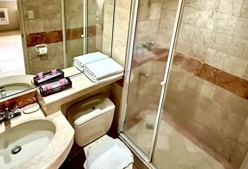 Отель Orchid Garden Suites