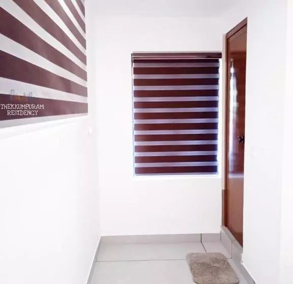 ホテル Thekkumpuram Residency