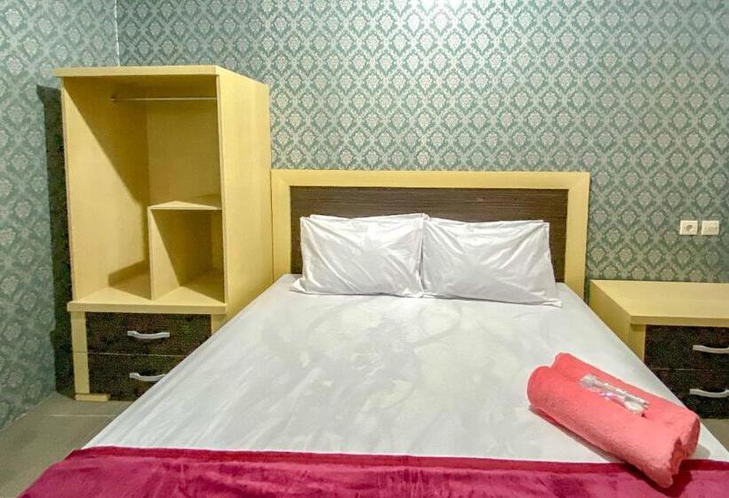 فندق Tini S Guest House Malang Mitra Reddoorz