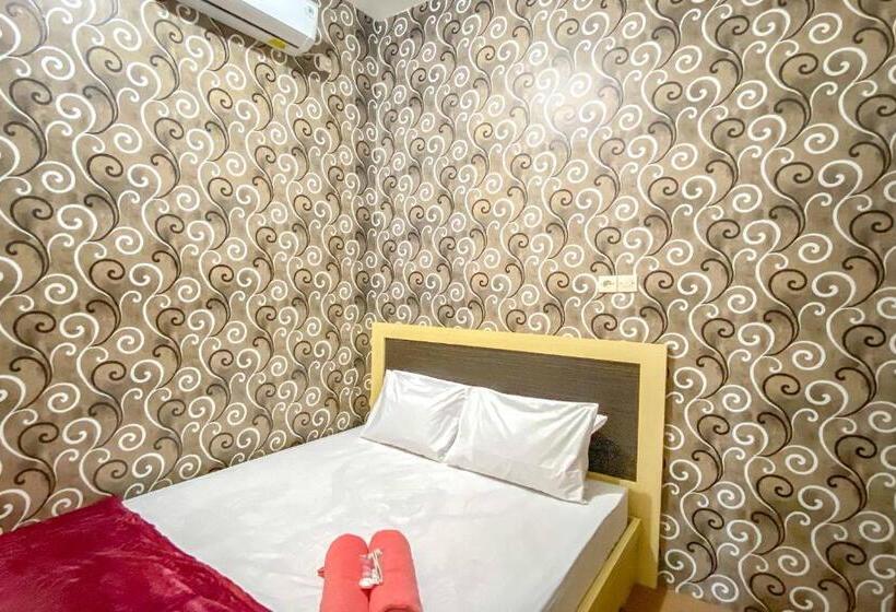 فندق Tini S Guest House Malang Mitra Reddoorz