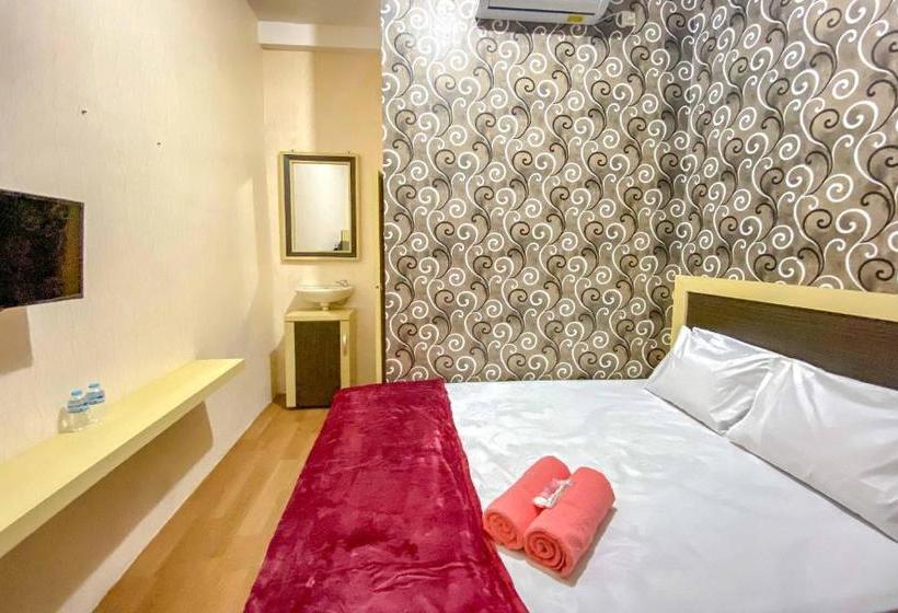 فندق Tini S Guest House Malang Mitra Reddoorz