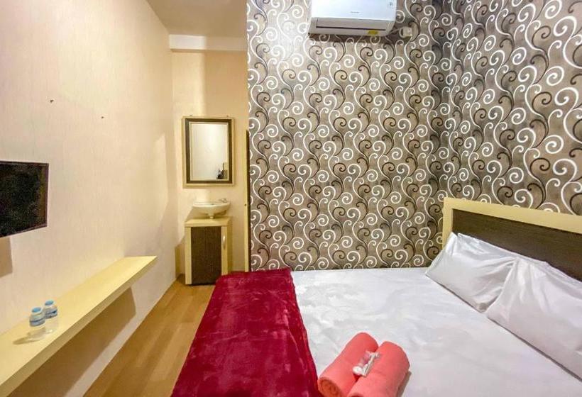 فندق Tini S Guest House Malang Mitra Reddoorz