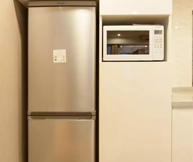 Отель Mango Garden City Business Apartment