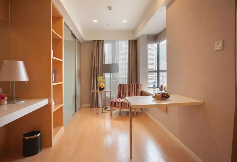 Отель Mango Garden City Business Apartment