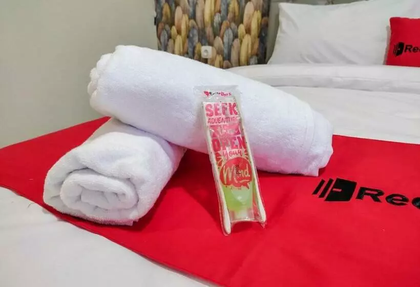 ホテル Reddoorz Syariah Near Gor Satria Area