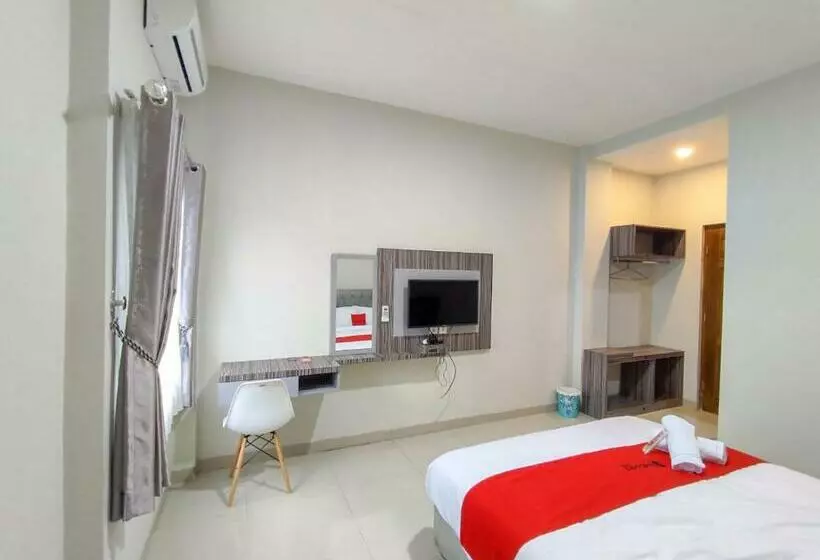 ホテル Reddoorz Syariah Near Gor Satria Area