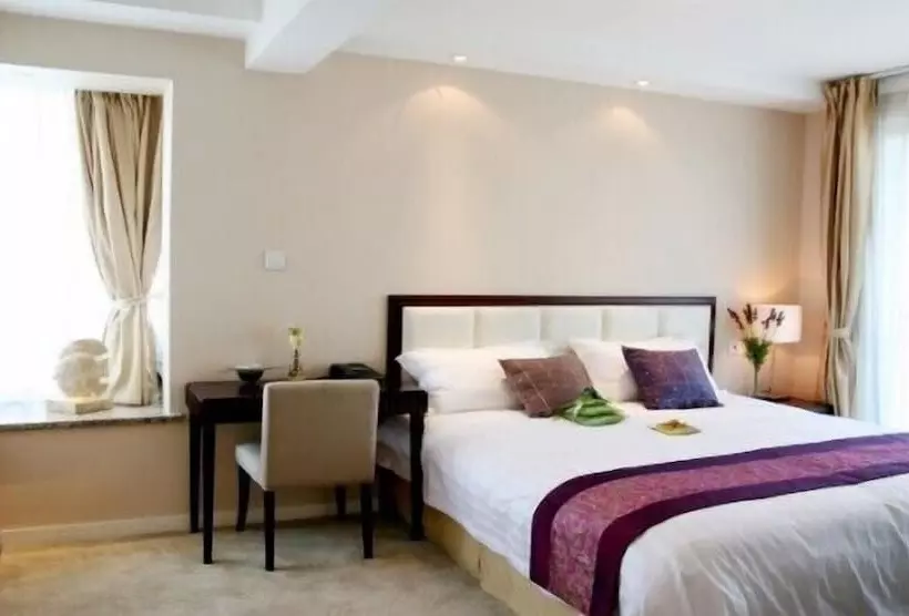 Отель Suzhou Regalia Serviced Residences