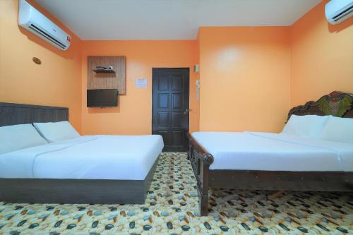 Spot On 89974 D Amigos Motel