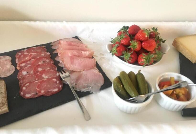 تختخواب و صبحانه Maison Piloni